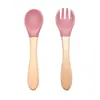 Popular juego de utensilios de silicona para alimentación de bebés, cuchara y tenedor, disponible en stock, cuenco de caracol con ventosa, cuchara infantil de combinación de madera de haya