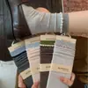 Calcetines de encaje de contraste café y verde hasta la mitad de la pantorrilla para mujer, rayas retro, adelgazantes, sin costuras, calcetines holgados, estilo academia japonesa, calcetines Zhuji