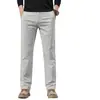 Pantalones casuales de alta gama para hombre de Hong Kong, nuevo estilo otoño 2026, pantalones rectos holgados elásticos para hombres de mediana edad