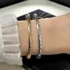 Pulsera Dorada Nueva Estilo Acolchada en Forma de V Inspirada en Chanel, Versiones Anchas y Estrechas, Incrustada con Diamantes, Venta al Por Mayor Directa de Fábrica, Fresca y Dulce, Artículo Popular Transfronterizo