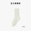 Calcetines de algodón puro para mujer, adecuados para primavera y otoño, de longitud media hasta la pantorrilla, color liso, diseñados para el uso posparto, absorbentes, transpirables, de ajuste holgado y con borde fruncido; al por mayor desde Zhuji