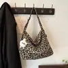 Bolso bandolera de cuadros estilo ins coreano para mujer, nuevo estilo verano 2026, bolso de hombro tipo dumpling fresco y elegante japonés para estudiante