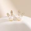 Pendientes de plata S925 con microincrustaciones de circonita y perla de conejo, a la moda, con un bonito diseño de nicho que combina con todo.