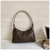 Bolso de axila de estilo francés de alta gama transfronterizo, nuevo y moderno y elegante bolso HOBO, bolso de hombro versátil, venta al por mayor