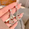 Pendientes de Aguja de Plata S925 Atmósfera de Festival Europeo y Americano Celebridad de Internet Sentido de Diseño Nicho Pendientes de Copo de Nieve de Zirconia Árbol de Navidad Colorido