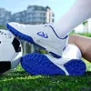 Zapatillas de fútbol de caña baja transfronterizas para niños y niñas, uñas rotas, TF, césped artificial, estudiantes jóvenes, cuero, zapatilla de entrenamiento para pies