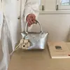Novedad Primavera 2026 Bolso Cubo Plateado para Mujer Moda para Ir al Trabajo Bolso de Mano Versátil Textura Plisada Bolso de Hombro Único Cruzado