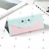 Fabricantes de cajas de gafas plegables triangulares portátiles personalizadas al por mayor para estudiantes hombres y mujeres, estilo coreano pequeño, fresco, lindo, personalidad creativa