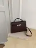 Bolsa de Mão de Alta Qualidade Transfronteiriça Feminina 2026 Nova Moda Retrô Versátil Bolsa Kelly Atacado Bolsa de Ombro Transversal