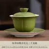 Juego de té matcha verde con borde dorado, que incluye una tetera de cerámica, un cuenco con tapa y tazas de té, en una caja de regalo, adecuado para uso doméstico y para recibir invitados.