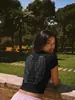 Top corto de manga corta con cuello redondo, ajuste ceñido, con estampado de alas, superventas transfronterizo europeo y americano, una camiseta acanalada moderna y versátil