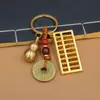 Estilo Étnico Chino Llavero de Monedas de los Cinco Emperadores Colgante de Calabaza Accesorio de Metal Decoración de Regalo de Alta Gama Venta al por Mayor