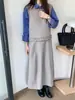 Conjunto Feminino Primavera 2026 Estilo Coreano Top Colete Sem Manga com Babados / Saia Longa de Cintura Alta em Linha A