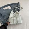 Bolso tipo cubo para mujer, nuevo Texte Mori 2024, mochila con cadena, elegante y moderna mochila cruzada con diseño de mariposa.