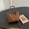 Bolsa pequena estilo explosivo popular deste ano para mulheres 2026 nova moda bolsa transversal versátil bolsa de mão super quente requintada bolsa saco