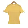 Novo estilo de top de malha de manga curta com gola redonda vazada e laço para mulheres, estilo puro desejo, top sexy semi-transparente para garotas quentes
