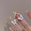 Pendientes de mariposa blanca de súper hada 2023, pendientes sencillos de esmalte frío para mujer, pendientes de nicho de celebridades de Internet con temperamento de Corea del Sur