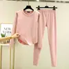 Novo conjunto de roupa íntima térmica feminina para outono e inverno: conjunto de duas peças: camiseta de manga longa com gola redonda e base em formato de arco, e calça longa justa e elástica