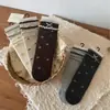 Calcetines de altura media con estampado floral y lazo de burbuja estilo coreano Peiqiao, dulces y femeninos, calcetines sin costuras de algodón puro, venta al por mayor de la industria del calcetín de Zhuji