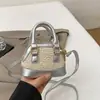 2025 Nueva Linda Bolsa Cruzada de Viaje para Niñas Estilo Infantil Diseño de Nicho Cartera Casual para Monedas Bolsa de Concha