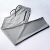 Pantalones finos de seda de hielo de verano para hombre, pantalones casuales, suministro de puesto, pantalones deportivos holgados, pantalones pitillo elásticos capri, pantalones con lazo en el tobillo