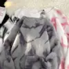 Ropa de punto de diseño retro americano para jóvenes de invierno, teñido anudado para hombres y mujeres, de alta gama, estilo guapo y relajado