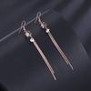 Nuevos aretes creativos de borla de moda para mujer, acero de titanio, oro rosa, cubo, circonita inteligente, aretes largos al por mayor