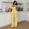 Conjunto de pijama de dos piezas para mujer estilo 'hot girl' europeo y americano, con top sin mangas de cuello halter, espalda descubierta y amarre, y pantalones de pierna ancha con cintura elástica
