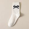 Otoño e invierno nuevos productos punto hilo lazo calcetines dulce viento académico calcetines de tubo serie miu viento ballet calcetines largos al por mayor