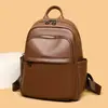 Mochila de cuero suave más vendida para exportación, nuevo modelo 2026, diseño simple, gran capacidad, mochila de viaje versátil y mochila escolar para estudiantes