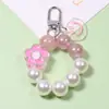 Llavero de Flor con Cara Sonriente Colgante DIY para Funda de Teléfono Móvil Cubierta Protectora para Aripods Colgante para Estuche de Auriculares Joyería