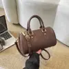 Bolsa de Bolos de Mano Retro de Gama Alta para Mujer Otoño e Invierno 2026 Bolso de Hombro Simple y de Moda Nuevo Bolso Cruzado Versátil