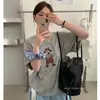 Camiseta de Manga Corta de Algodón Puro Estilo Coreano Verano 2026 Estampado de Cachorro con Cuerda de Saltar de Dibujos Animados para Mujer, Top Holgado Casual Versátil que Reduce la Edad