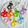 Estrella Hueca de Cinco Puntas Acrílica Campana Hebilla de Puerta de Llave Llavero Cabeza de Bolso Cubierta de Auriculares Colgante Pequeño Decorativo Joyería Colorido