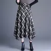 Saia Xadrez Irregular Estilosa 2026 Outono/Inverno Nova Moda Cintura Alta Comprimento Médio Elegante para o Trabalho Barra Larga