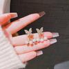 Nuevos pendientes de perlas de lujo ligero de moda 2022 para mujer, diseño de nicho, rojo de moda en línea, pendientes de mariposa de dos piezas para mujer