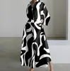 Vestido Cruzado Europeo y Americano 2026 Estilo Nuevo Casual de Oficina Moda Cuello Polo Manga Larga con Cintura Elástica y Dobladillo Amplio
