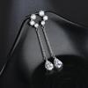 Versión coreana de aretes largos de borla aretes de moda para mujer temperamento gotas de agua aretes de circonita de grado AAA lote mixto directo de fábrica