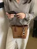 Bolsa tote transfronteiriça, de alta qualidade, fashion e de grande capacidade para mulheres, nova coleção de outono 2026, bolsa de ombro retrô e minimalista, bolsa transversal moderna