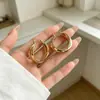 Aretes de clip de lujo ligero de moda, brazaletes para oreja versátiles, temperamento, personalidad, modernos, aretes de celebridad de internet, aretes pequeños exquisitos, al por mayor, oro