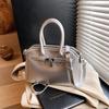 Comercio Exterior Super Caliente Bolsa Pequeña Mujer Primavera y Verano 2025 Nuevo Bolso Bandolera de Hombro Versátil Casual Nicho Portátil Bolso Kelly