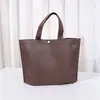 Em estoque Bolsa de TNT Botão de pressão de ângulo reto Bolsa Tote Com fundo Sem laterais Sacola de compras Impressão personalizada Bolsa tote de TNT