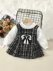 Atacado de Roupas Infantis para Comércio Exterior de Outono, Laço na Cintura Frontal, Vestido Longo de Manga Longa para Meninas Estilo Pequena Chanel, Entrega em Peça Única, Estampa Xadrez