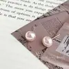 Atmósfera de primavera pendientes de perla de panecillo rosa alto sentido temperamento pendientes vintage 2025 nuevos pendientes para mujer