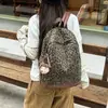 Mochila Feminina de Veludo Portátil com Alça Única Moda Nova Outono Inverno Sensação de Nicho Camurça Estampa de Leopardo 2026 Retro Dupla Alça