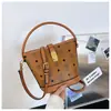 Elegante bolso pequeño para mujer 2025 nuevo bolso tipo cubo con estampado vintage bolso de mano bolso de hombro cruzado de moda para el trabajo