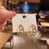 Pendientes Redondos Huecos de Zirconia Chapados en Oro Real de 14K Lujo Accesible Pendientes Personalizados Simples y Versátiles de Gama Alta de Nicho para Mujer