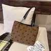 Bolsa de gran capacidad para el día a día, nuevo bolso tote de lunares 2026, bolso de hombro para mujer, bolso de mano elegante y versátil con un toque de alta gama