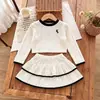 Conjunto de Dos Piezas para Niñas: Top Suave de Punto Texturizado con Cuello Redondo + Falda Corta con Dobladillo Fruncido - Nuevo Otoño 2026