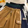 Pantalones Cortos de Verano 2024 para Hombre Estilo Americano Pantalones de Trabajo de Cinco Puntos Pierna Ancha Holgados Casuales Marca de Moda High Street Pantalones Deportivos de Baloncesto